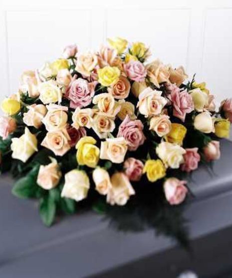 Casket spray of Pastel roses