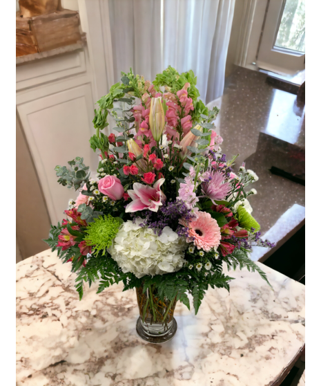 pink and green floral arrangement 